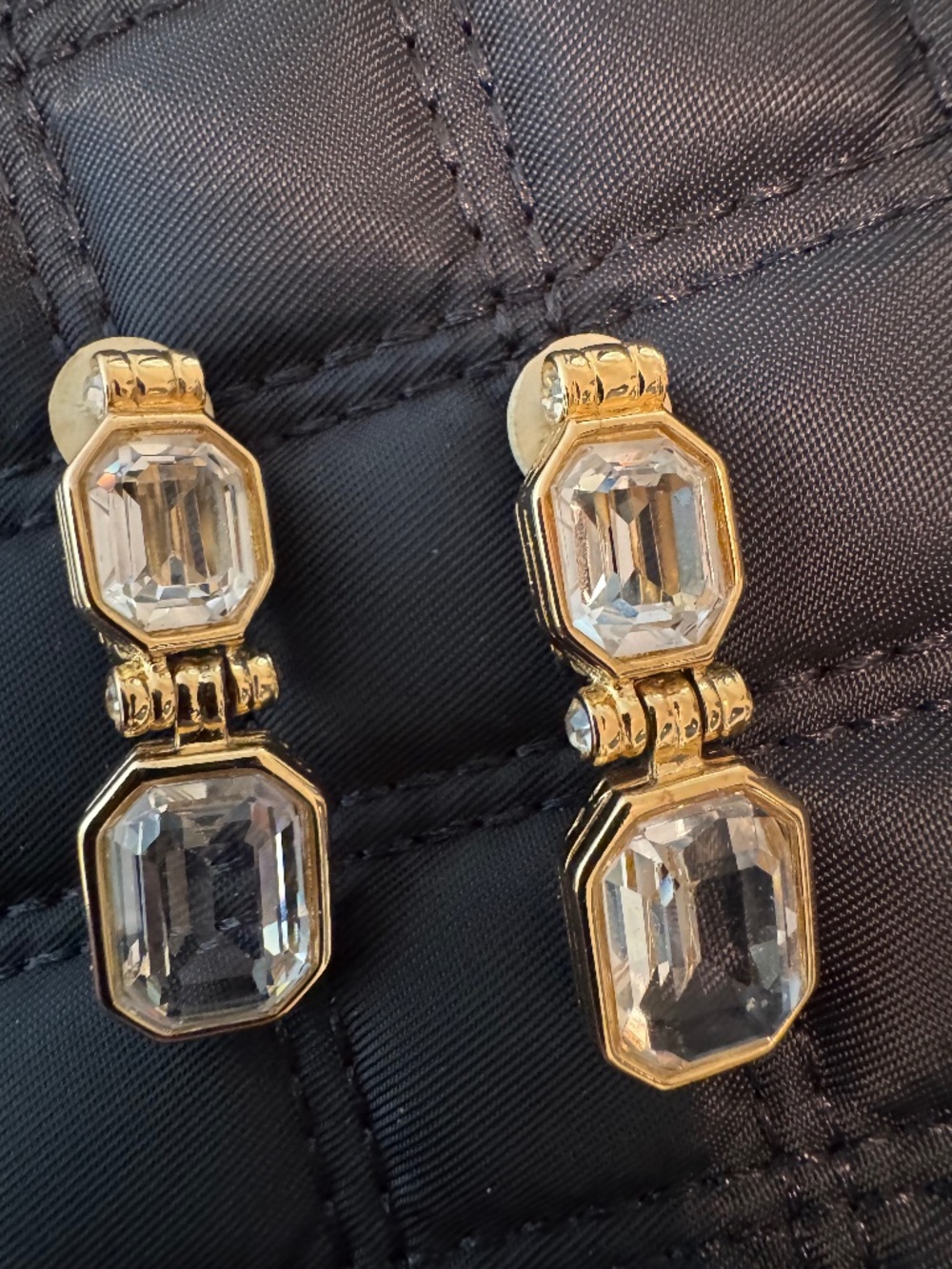 Vintage Nina Ricci emerald cut crystal clip on earrings.